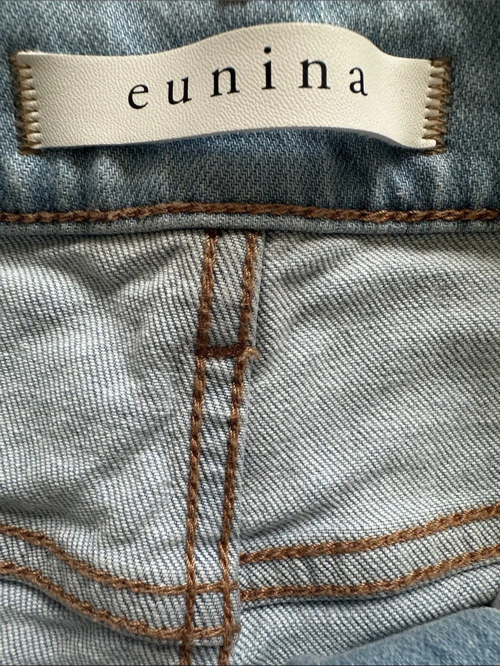 eunina Light Wash Distressed Denim Shorts